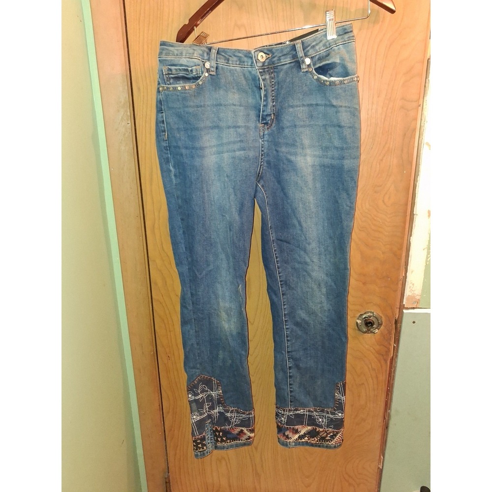 Women's John Mark  blue jeans with embroidered hem detail